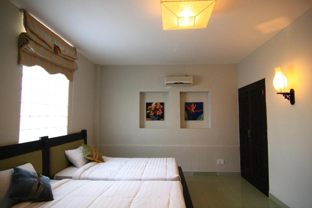 Faifoo Boutique Hotel Ho Si Minh-város Szoba fotó